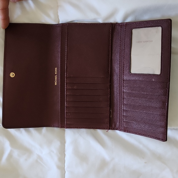 Michael kors burgundy Bi Fold wallet. - Picture 2 of 6